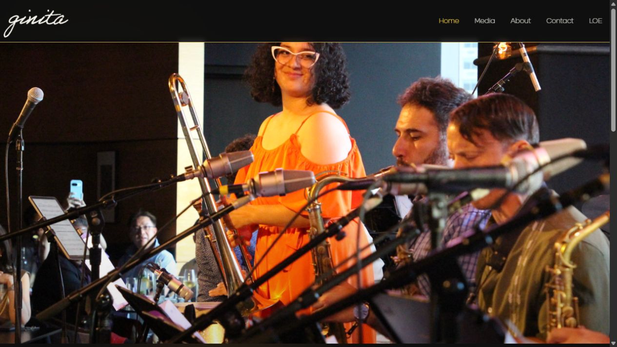 Ginita’s Website public homepage featuring a live music performance